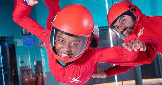 student and instructor flying in tunnel