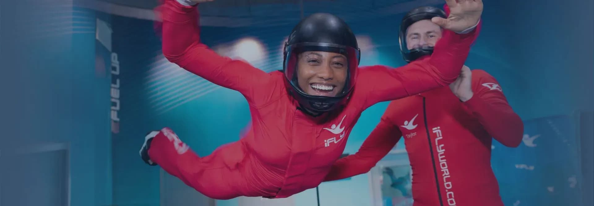 woman flying with arms out